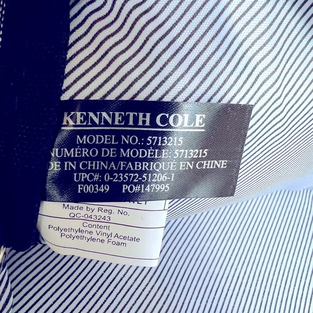 Dark Black Quilted Chevron Backpack with Gold Accents by Kenneth Cole Reaction.